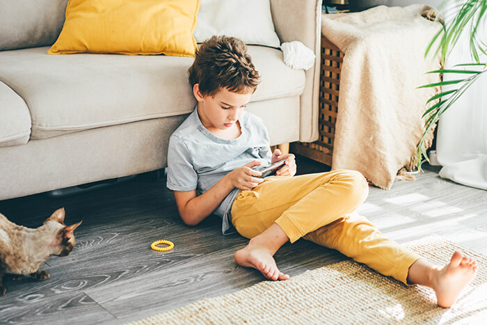 Child playing mobile game